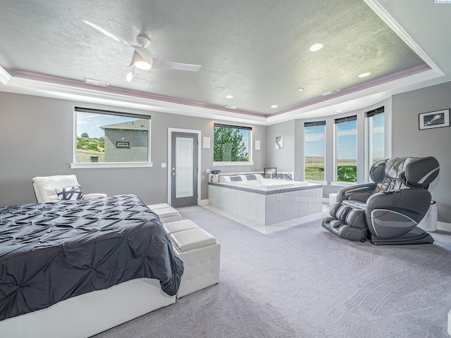 5880 S 58th Ave, West Richland, WA 99353 - carpeted bedroom with a tray ceiling, a textured ceiling, recessed lighting, and ceiling fan