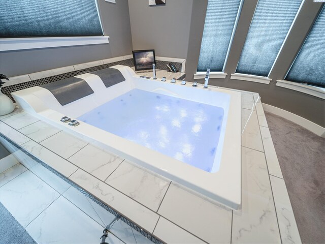 5880 S 58th Ave, West Richland, WA 99353 - miscellaneous room with marble look tile flooring and baseboards