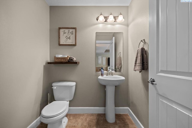 5200 W 28th Ave, Kennewick, WA 99338 - bathroom with toilet, baseboards, and tile patterned flooring