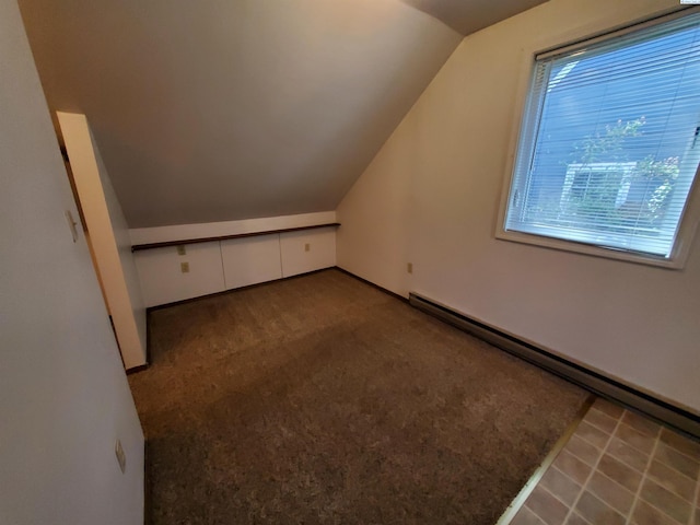 bonus room with vaulted ceiling and baseboard heating