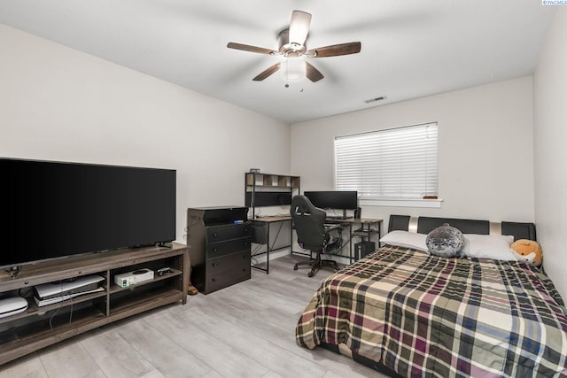 1335 W Grandview Ave, Sunnyside, WA 98944 - bedroom with wood finished floors and a ceiling fan