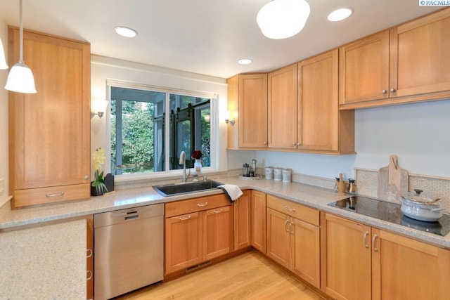 1935 Harris Ave, Richland, WA 99354 - kitchen with dishwasher, black electric stovetop, light wood finished floors, hanging light fixtures, and recessed lighting