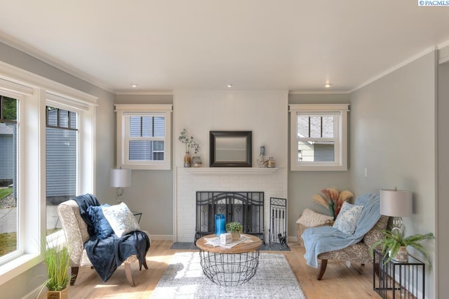 1935 Harris Ave, Richland, WA 99354 - living area featuring a fireplace, light wood-style floors, plenty of natural light, ornamental molding, and recessed lighting