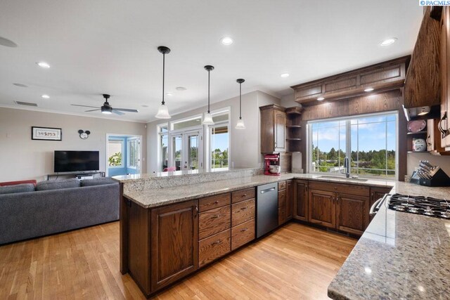 970 SW Itani Dr, Pullman, WA 99163 - kitchen with stainless steel dishwasher, a sink, open shelves, a peninsula, and ornamental molding