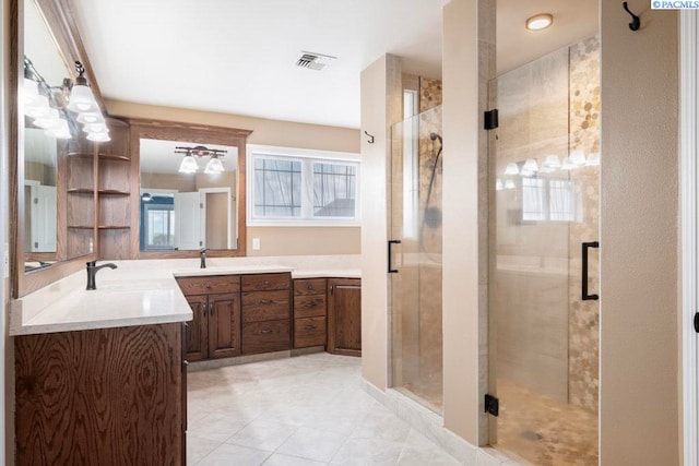 970 SW Itani Dr, Pullman, WA 99163 - full bathroom with vanity, a shower stall, and tile patterned floors