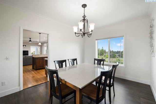 970 SW Itani Dr, Pullman, WA 99163 - dining space featuring a chandelier, baseboards, ornamental molding, and dark wood finished floors
