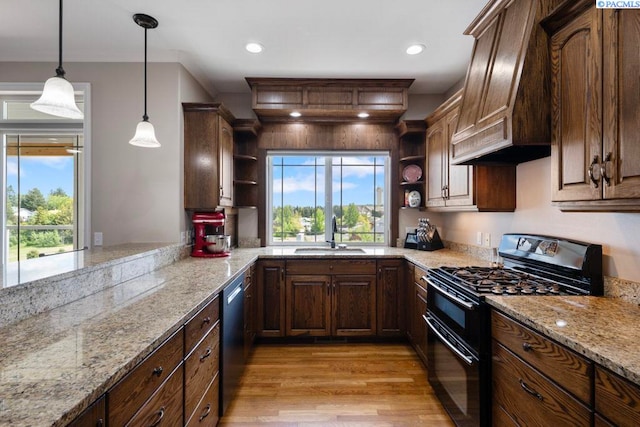 970 SW Itani Dr, Pullman, WA 99163 - kitchen with double oven range, open shelves, a sink, light wood-style floors, and recessed lighting