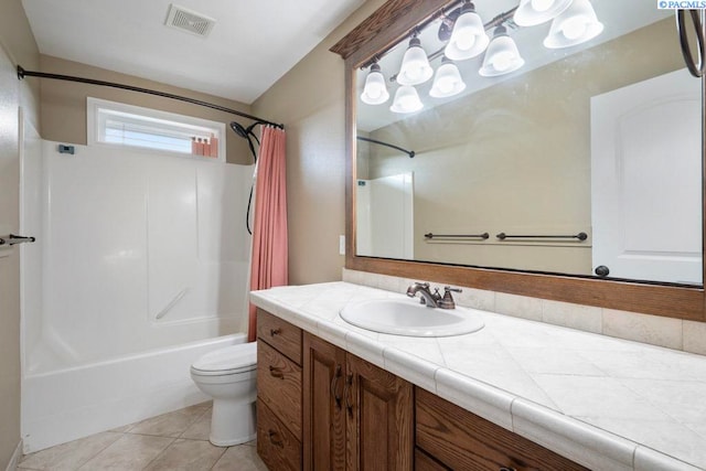 970 SW Itani Dr, Pullman, WA 99163 - bathroom with shower / bath combo, toilet, vanity, and tile patterned flooring