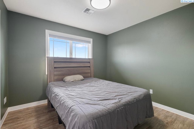970 SW Itani Dr, Pullman, WA 99163 - bedroom with baseboards and wood finished floors