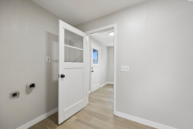 447 S Wilbur Ave, Walla Walla, WA 99362 - interior space featuring light wood-style floors, baseboards, hookup for an electric dryer, and laundry area
