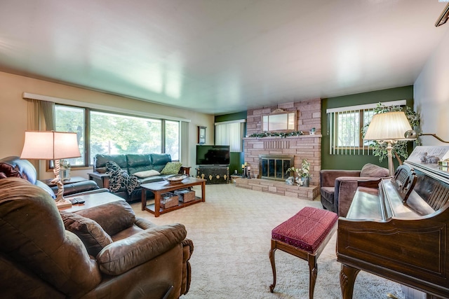 609 N Perkins Ave, Colfax, WA 99111 - living area featuring plenty of natural light, carpet flooring, and a large fireplace