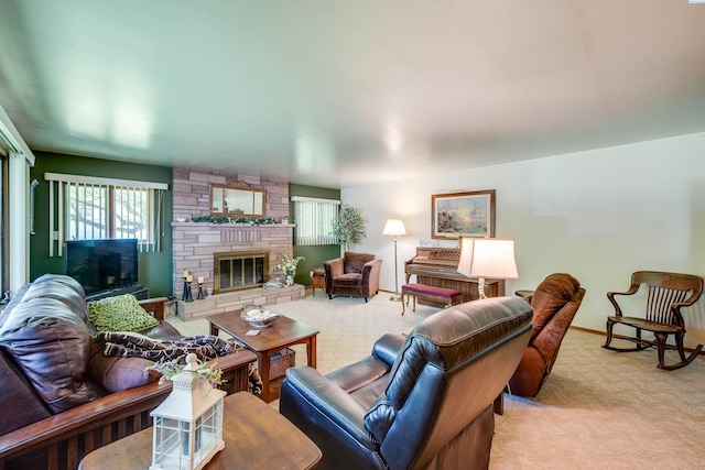 609 N Perkins Ave, Colfax, WA 99111 - living area featuring light carpet, a stone fireplace, and baseboards
