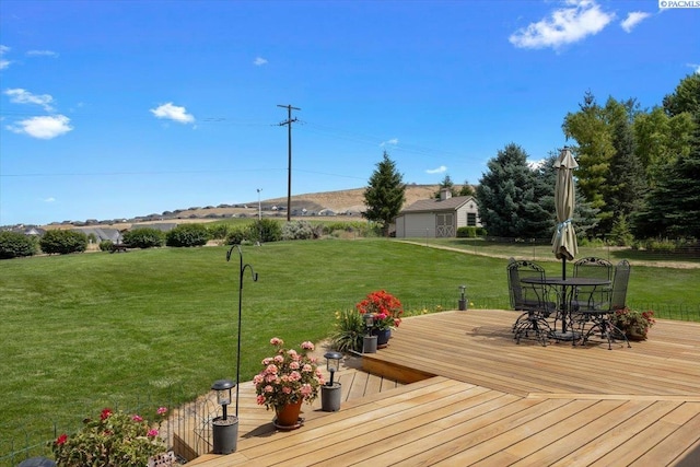 96604 E Clover Rd, Kennewick, WA 99338 - wooden terrace featuring a lawn and outdoor dining area