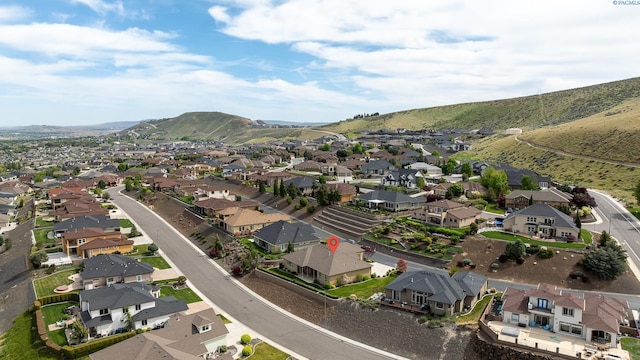 bird's eye view featuring a mountain view and a residential view
