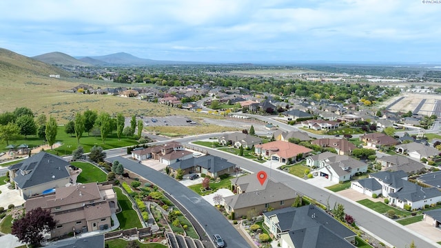 aerial view with a mountain view and a residential view