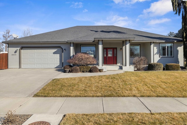 single story home featuring a front yard, an attached garage, driveway, and a shingled roof