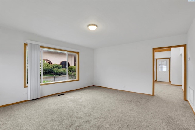 807 N Main St, Colfax, WA 99111 - carpeted empty room featuring baseboards