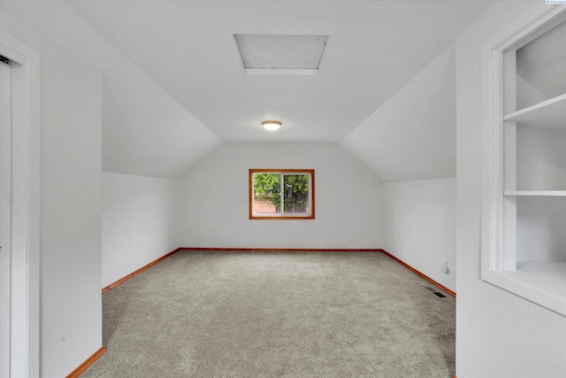 807 N Main St, Colfax, WA 99111 - bonus room with carpet flooring, attic access, vaulted ceiling, and baseboards