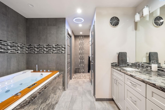 9115 W Maple Dr, Pasco, WA 99301 - bathroom featuring a shower stall, a jetted tub, vanity, and recessed lighting
