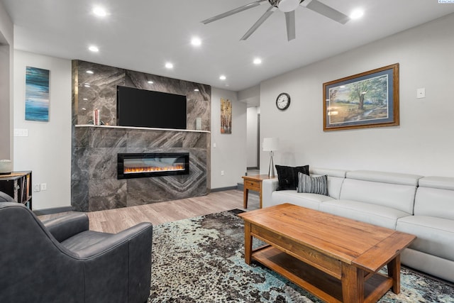 9115 W Maple Dr, Pasco, WA 99301 - living room featuring wood finished floors, ceiling fan, a premium fireplace, and recessed lighting