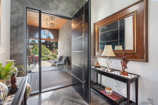 9115 W Maple Dr, Pasco, WA 99301 - doorway to outside with a chandelier