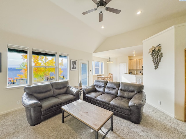 living area with lofted ceiling, baseboards, carpet flooring, and recessed lighting