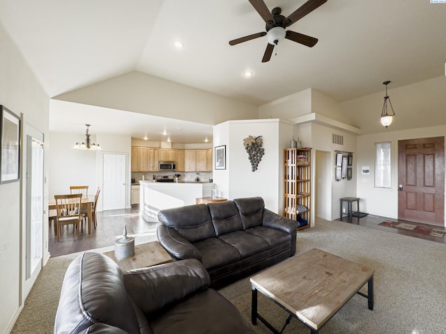 living area featuring lofted ceiling, visible vents, carpet flooring, and recessed lighting