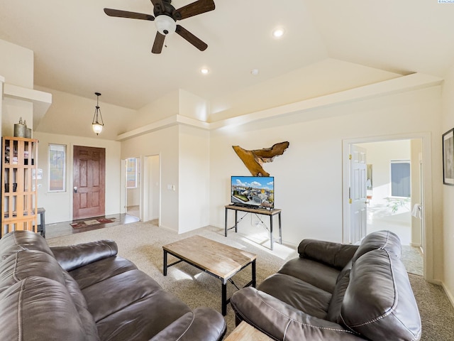 living room featuring lofted ceiling, ceiling fan, recessed lighting, and light colored carpet