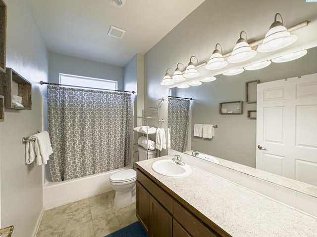 bathroom with toilet, visible vents, baseboards, vanity, and shower / tub combo with curtain