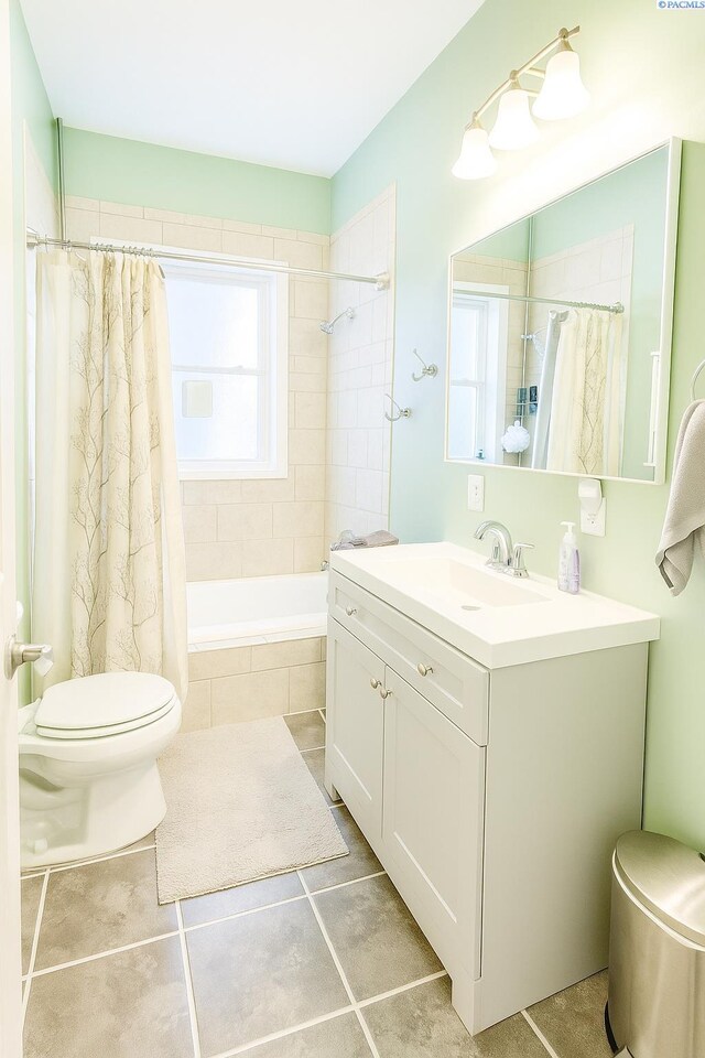 408 S Mill St, Colfax, WA 99111 - bathroom featuring tile patterned flooring, vanity, and tiled shower / bath combo