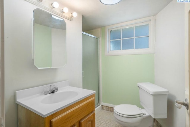 408 S Mill St, Colfax, WA 99111 - bathroom featuring vanity, a shower stall, and tile patterned flooring