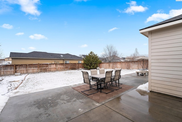 view of snow covered patio