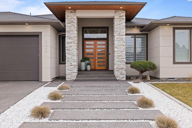 property entrance with a garage