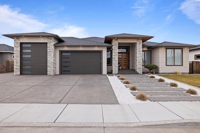 prairie-style home with a garage