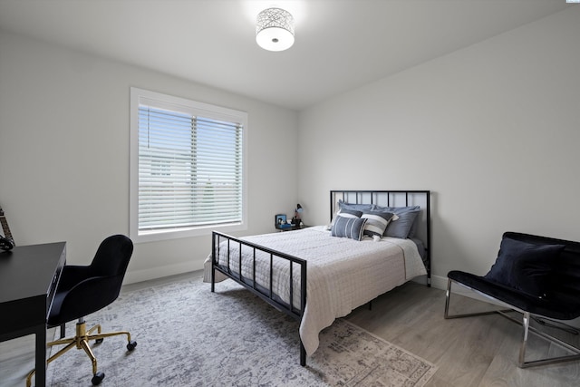 bedroom featuring light hardwood / wood-style floors