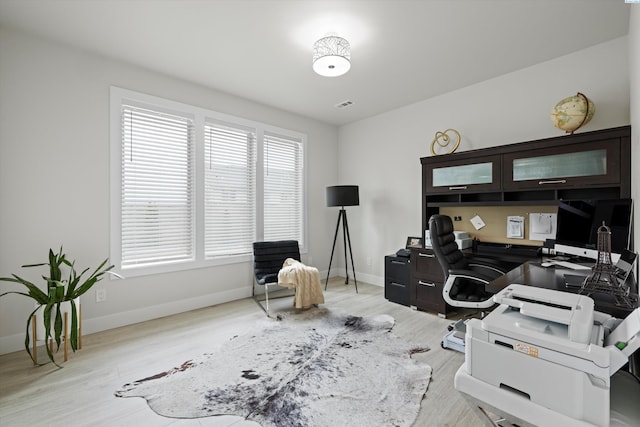 office space featuring light hardwood / wood-style floors