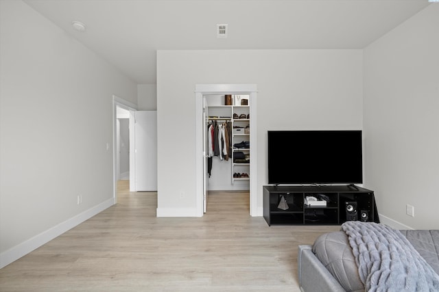 living room with light hardwood / wood-style floors