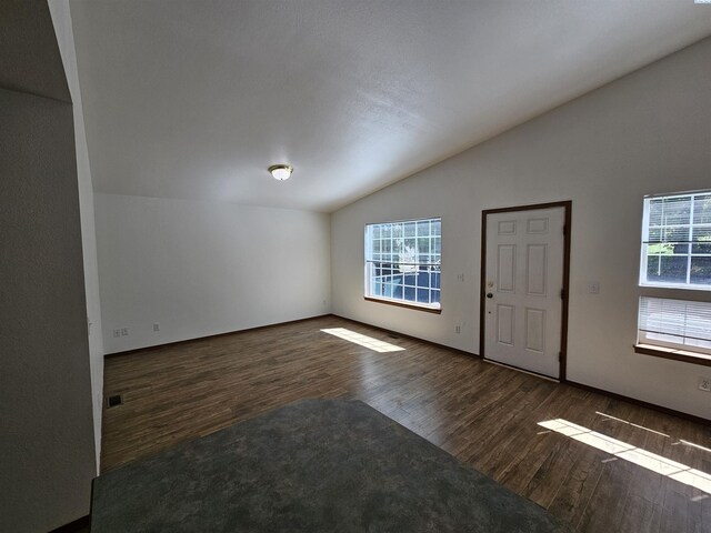 1135-1137 NE Indiana St, Pullman, WA 99163 - entrance foyer featuring a healthy amount of sunlight, vaulted ceiling, wood finished floors, and visible vents