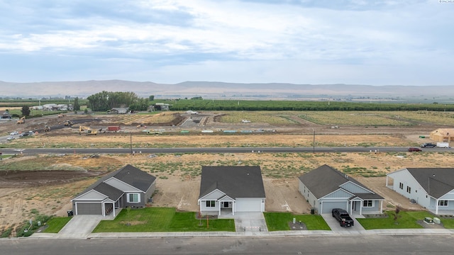 bird's eye view with a rural view and a mountain view