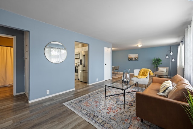 living room featuring dark hardwood / wood-style floors