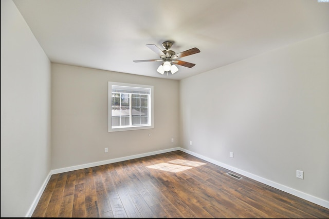 745 SE Carolstar Dr, Pullman, WA 99163 - spare room with a ceiling fan, baseboards, and dark wood-style flooring