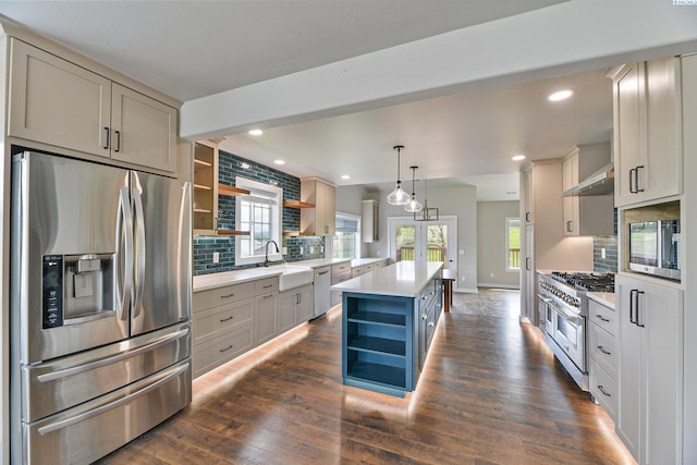 745 SE Carolstar Dr, Pullman, WA 99163 - kitchen with stainless steel appliances, open shelves, a sink, light countertops, and recessed lighting