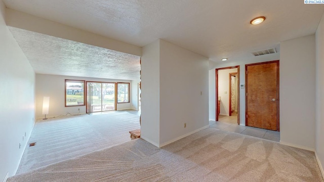 269 Gage Blvd, Richland, WA 99352 - empty room featuring light colored carpet and a textured ceiling