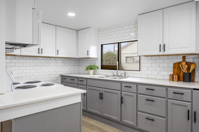 1517 Perkins Ave, Richland, WA 99354 - kitchen featuring gray cabinets, a sink, light countertops, tasteful backsplash, and recessed lighting