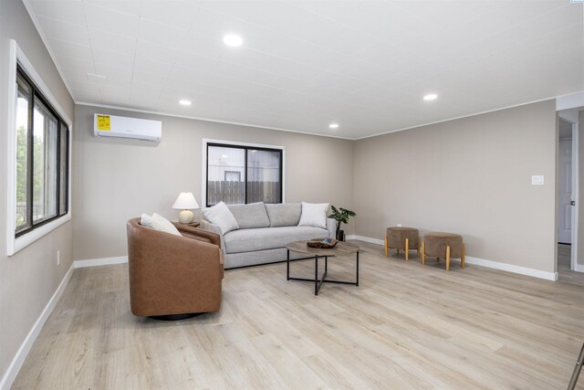 1517 Perkins Ave, Richland, WA 99354 - living area featuring an AC wall unit, light wood-type flooring, baseboards, and recessed lighting
