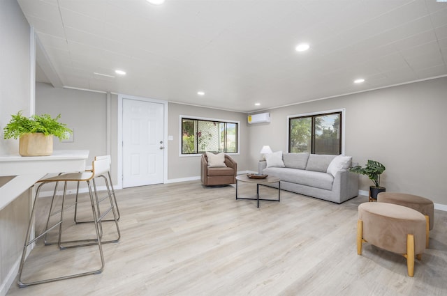 1517 Perkins Ave, Richland, WA 99354 - living area with a wall mounted AC, light wood-style flooring, recessed lighting, and baseboards