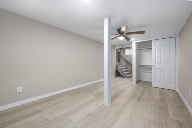 1517 Perkins Ave, Richland, WA 99354 - unfurnished bedroom featuring light wood-style floors, baseboards, a ceiling fan, and a closet