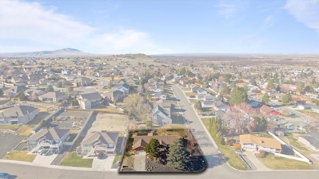 birds eye view of property with a residential view