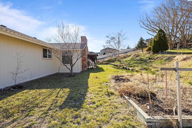 view of yard featuring fence