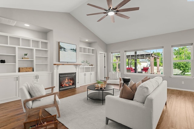 19 Ivy Ln, Pasco, WA 99301 - living room featuring plenty of natural light, wood finished floors, ceiling fan, high vaulted ceiling, and recessed lighting
